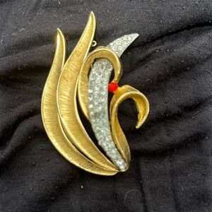 Vintage BSK signed brooch. Graceful leaf with crystals and a red accent.